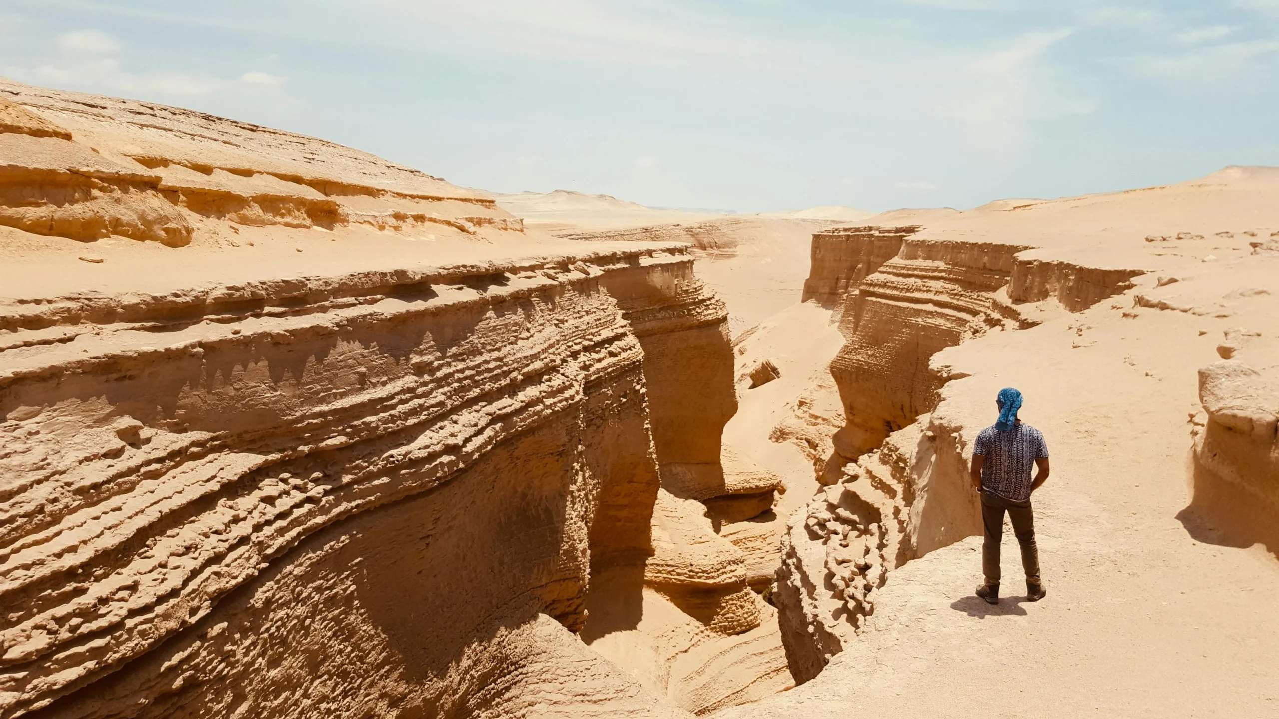 A tourist in the Lost Canyon of Ica