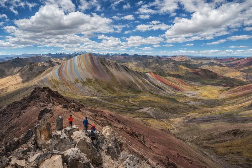 Palccoyo Rainbow Mountain in Cusco with colorful mineral stripes and panoramic Andean landscape