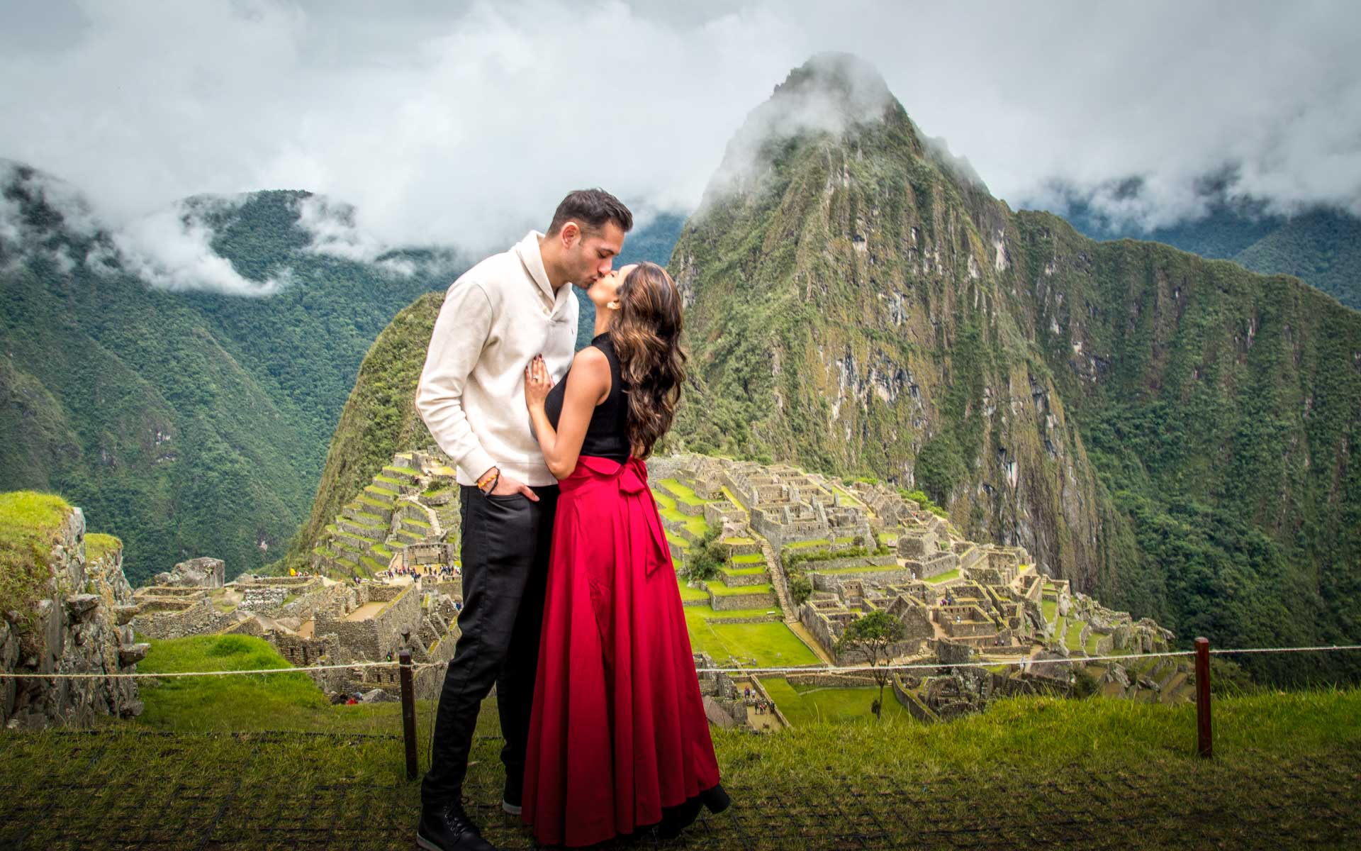 Couple enjoying a visit to Machu Picchu